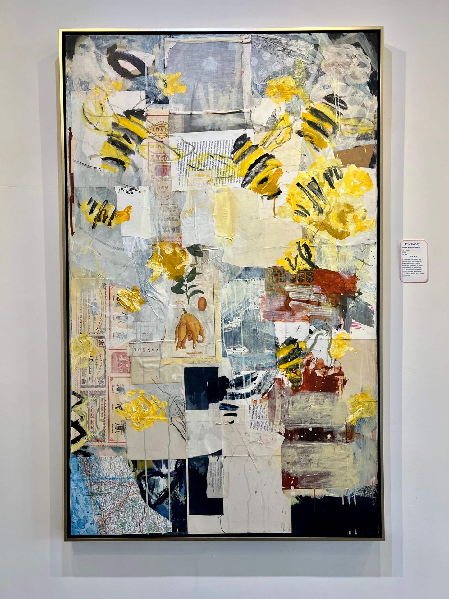 Raw Honey 58” x 36” mixed media collage framed in neutral metal finish